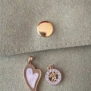 14k yellow gold Symbol of love (Chinese) charm by Mary margrill